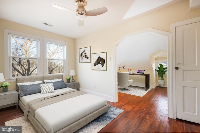 bedroom featuring ceiling fan and dark hardwood / wood-style floors