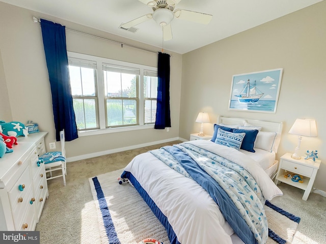 carpeted bedroom with ceiling fan