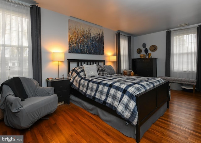 bedroom featuring dark hardwood / wood-style floors