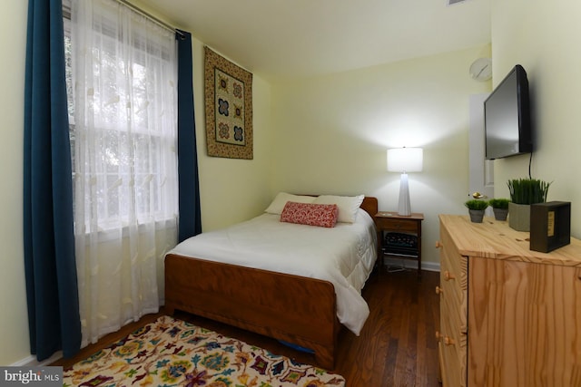 bedroom featuring dark hardwood / wood-style floors