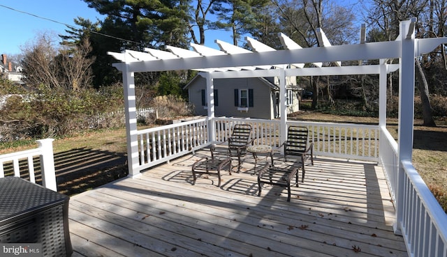 wooden deck with a pergola