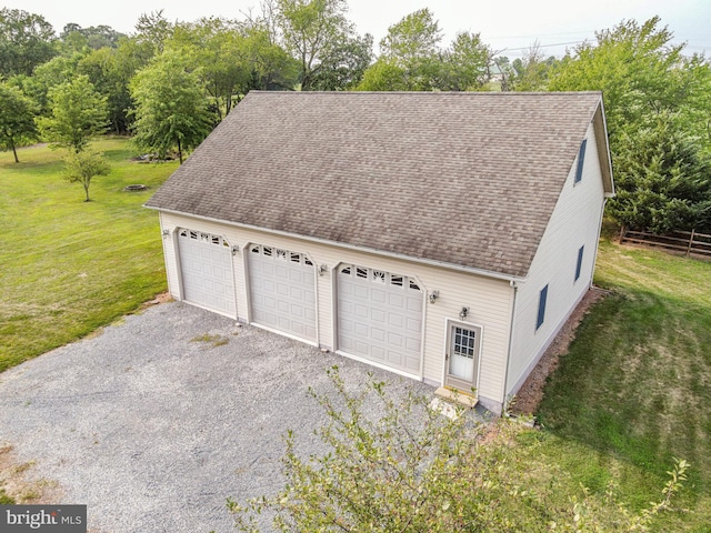 garage with a lawn