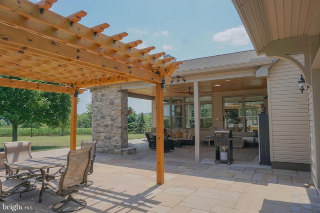 view of patio featuring a pergola and an outdoor hangout area