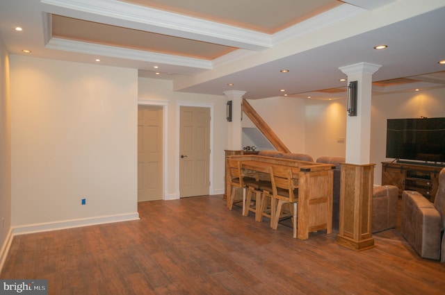 interior space with hardwood / wood-style flooring and crown molding