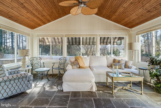 sunroom with wood ceiling, ceiling fan, and vaulted ceiling