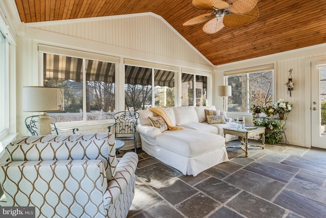 unfurnished sunroom with vaulted ceiling, ceiling fan, and wood ceiling