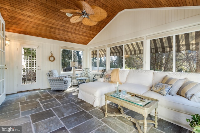 sunroom featuring wood ceiling, vaulted ceiling, and ceiling fan