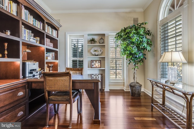 home office featuring ornamental molding and dark hardwood / wood-style floors