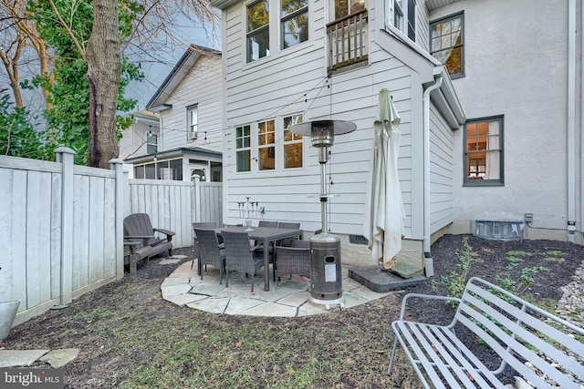 rear view of house featuring a patio area