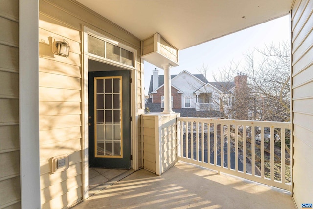 entrance to property featuring a balcony