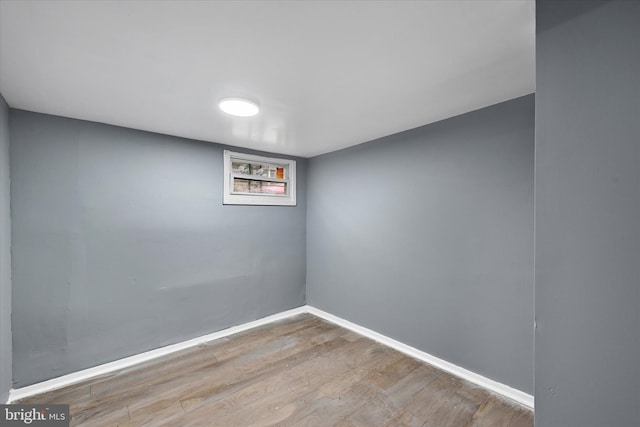 spare room with light hardwood / wood-style flooring