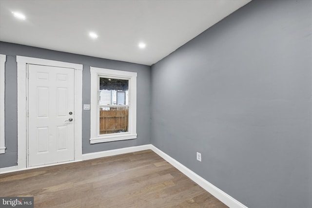 foyer entrance featuring hardwood / wood-style floors