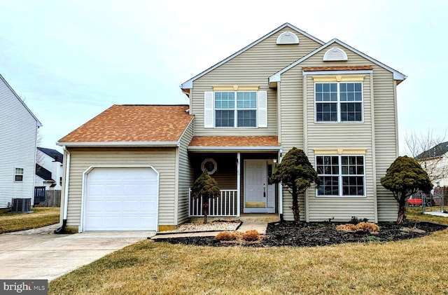 view of front property featuring a garage, a front lawn, central air condition unit, and a porch