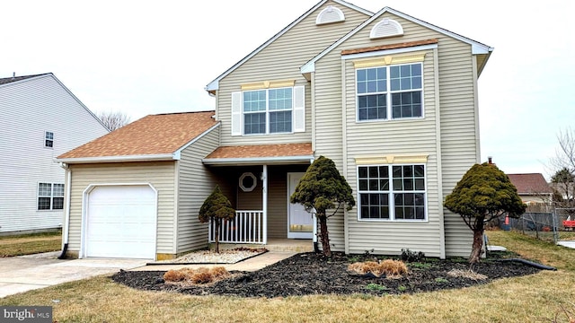 front facade with a garage, covered porch, and a front lawn