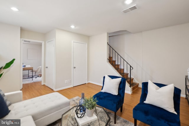 living room featuring wood-type flooring