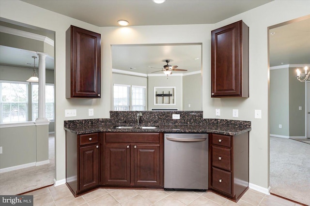 kitchen featuring light colored carpet, dark stone counters, dishwasher, and sink