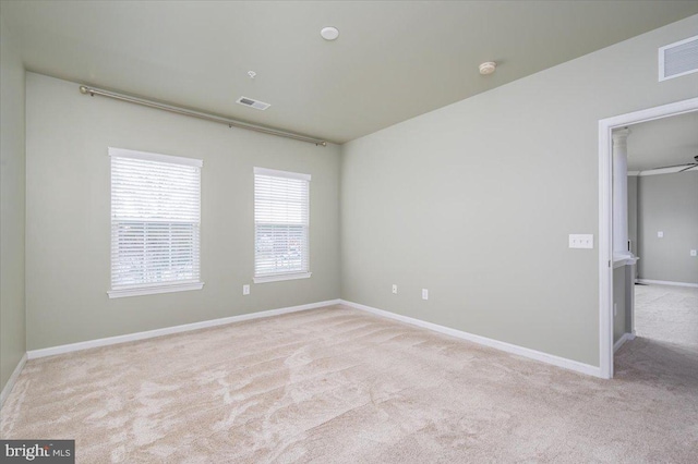 view of carpeted spare room