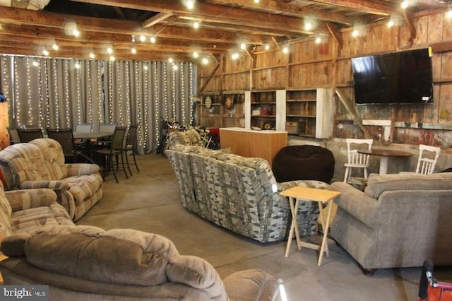 living room featuring concrete flooring