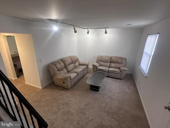 living room featuring carpet floors