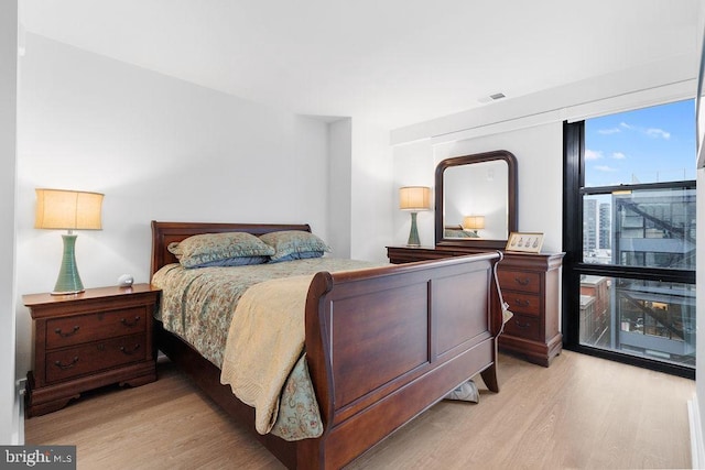 bedroom featuring light hardwood / wood-style floors