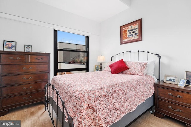 bedroom featuring light wood-type flooring