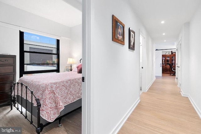 bedroom featuring light wood-type flooring