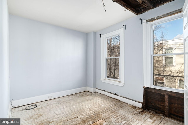 empty room featuring light hardwood / wood-style floors