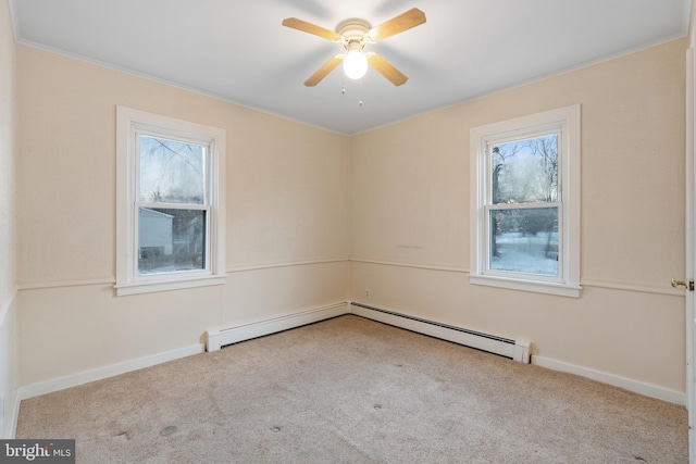 unfurnished room with ceiling fan, light colored carpet, and a wealth of natural light