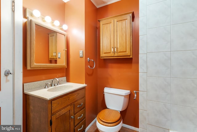 bathroom with vanity and toilet