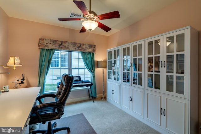 office featuring light colored carpet and ceiling fan