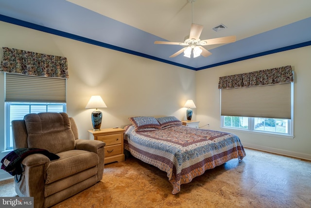 bedroom with crown molding and ceiling fan