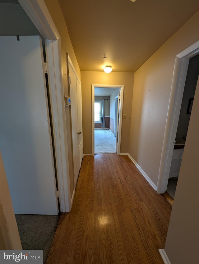 corridor featuring light wood-type flooring