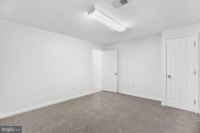 unfurnished room with carpet