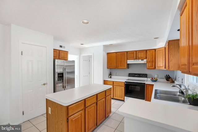 kitchen with range with electric stovetop, sink, a center island, light tile patterned floors, and stainless steel fridge with ice dispenser