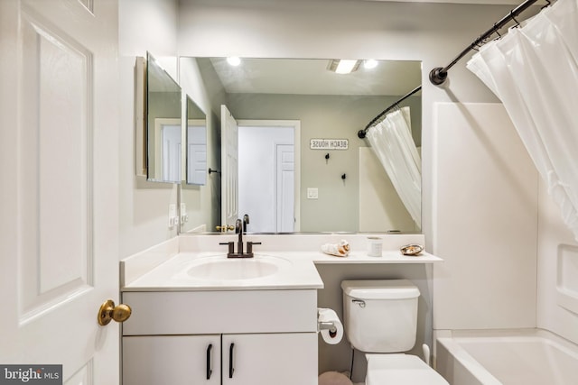 full bathroom featuring vanity, toilet, and shower / tub combo with curtain