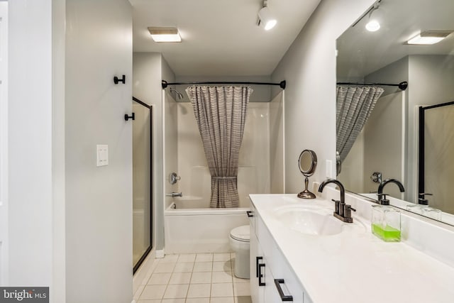 full bathroom with tile patterned flooring, vanity, shower / bath combination with curtain, and toilet