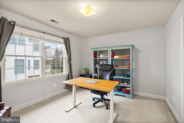 view of carpeted office space