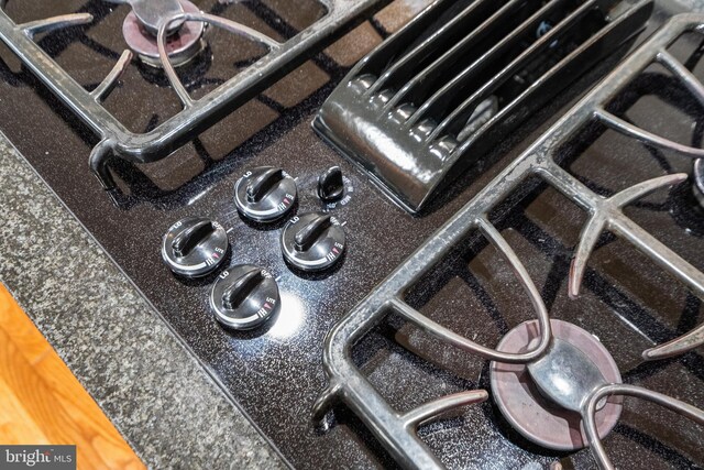 interior details with dark stone counters and stovetop