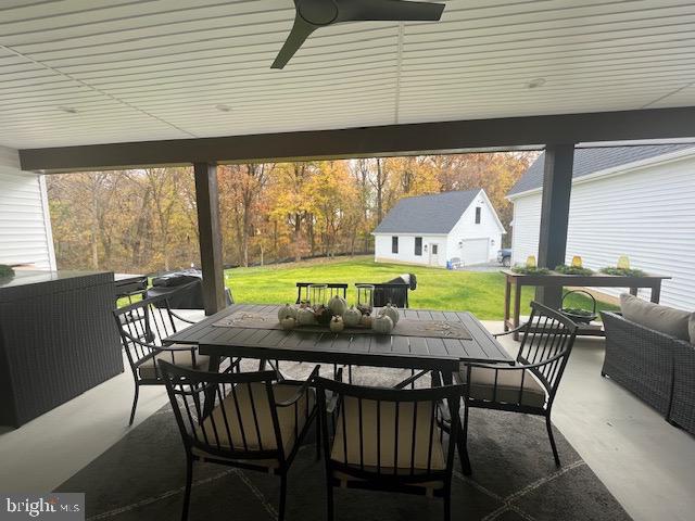 view of patio / terrace with ceiling fan