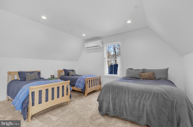 carpeted bedroom with vaulted ceiling and a wall unit AC