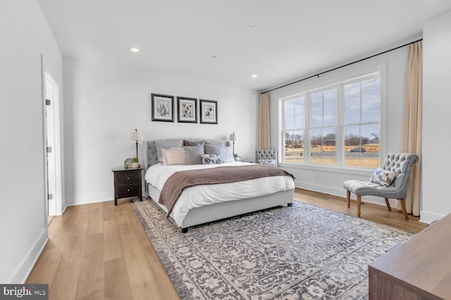 bedroom featuring light hardwood / wood-style floors