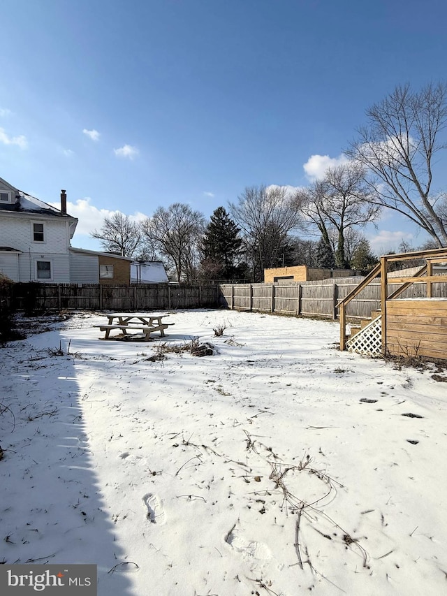 view of snowy yard