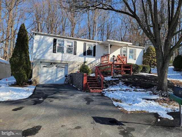 view of front of property featuring a garage