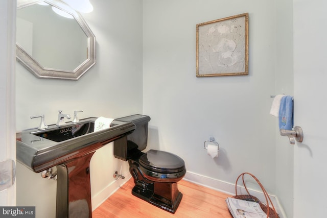 bathroom featuring hardwood / wood-style flooring