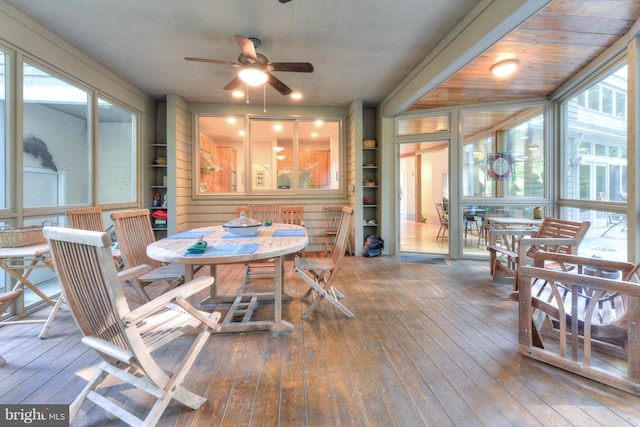 sunroom / solarium with ceiling fan