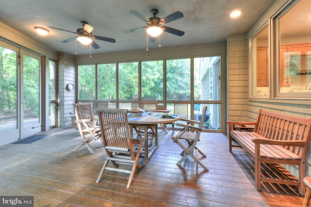 sunroom / solarium with ceiling fan