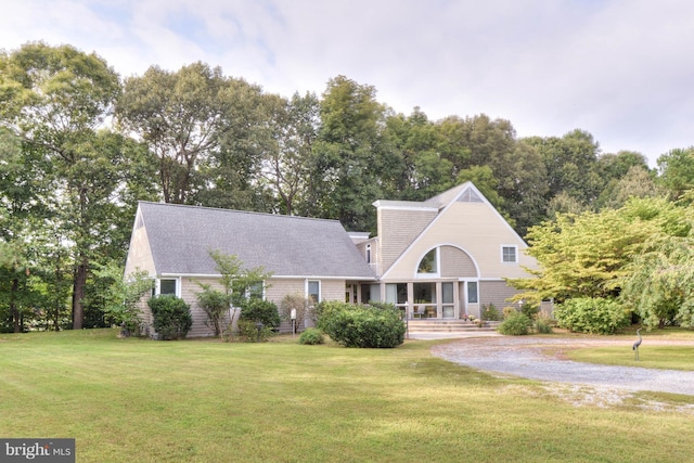 view of front of home with a front yard