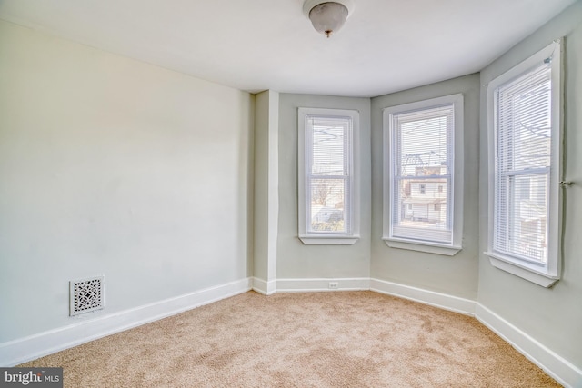 view of carpeted spare room