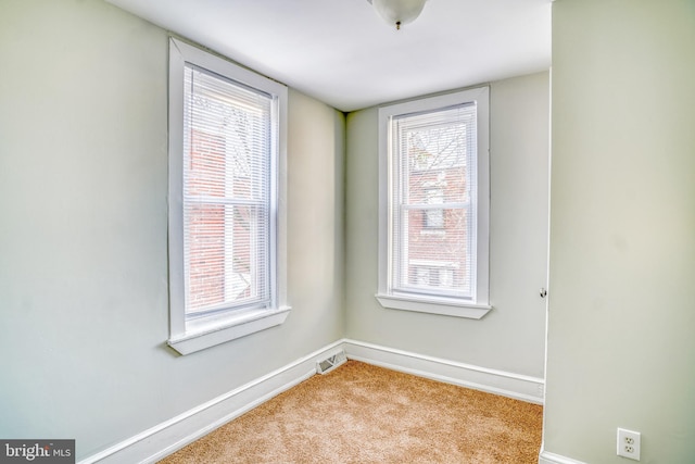 view of carpeted spare room