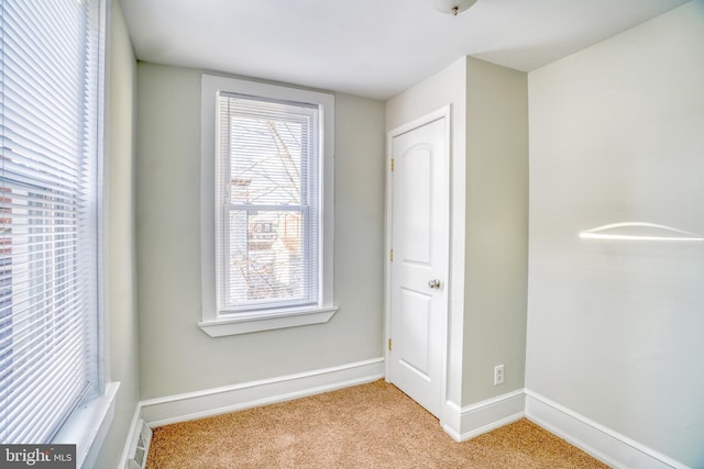 interior space with light colored carpet